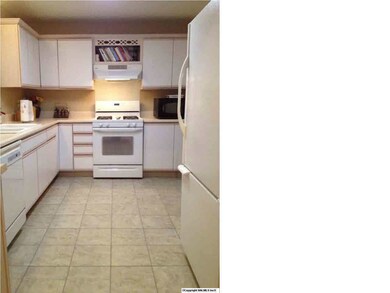 This fully equipped kitchen with gas stove, microwave, dishwasher, disposal and refrigerator is the perfect place to prepare a meal.