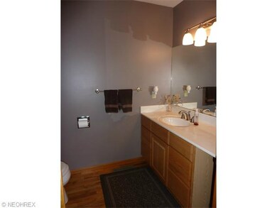 Nice Sized Half Bath off Foyer .... Hardwood Floor