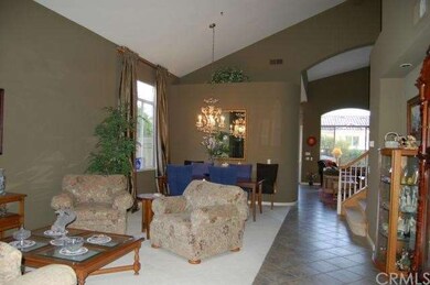 Formal living room & dining room looking in the fa
