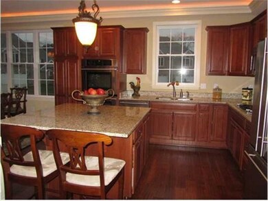 Kitchen. Gourmet cherry stained kitchen with large