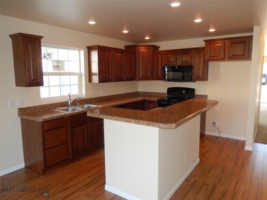 Kitchen. Photo of similar home.