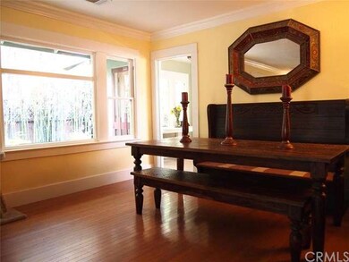 Living room, view of backyard bamboo and door to k