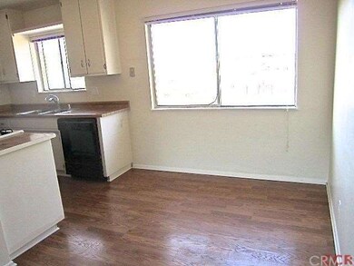 Large window with back yard view