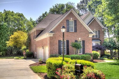 Full brick home with flat driveway and 3 car garag