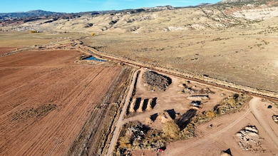 View of property location with rural landscape and a mountain backdrop