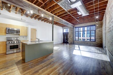 Kitchen featuring stainless steel appliances, bri