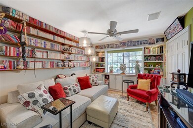 Relax with a good book in the den, complete with b