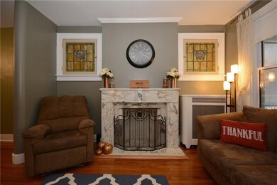 Decorative fireplace and those beautiful stained g