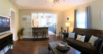 The living room measures 15' X 13' and is open to 