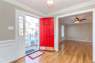 Foyer entry newly painted with freshly refinished