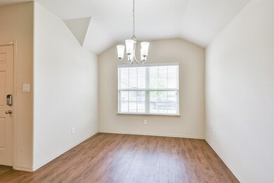 Dining in front of home with plenty of light.