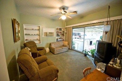 Den with slider to patio and garden