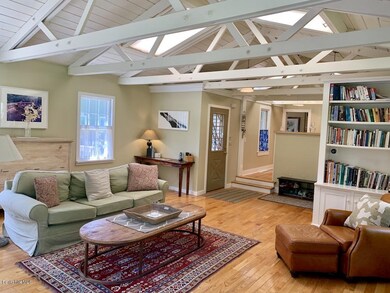 Living Room to Entry Door & Kitchen