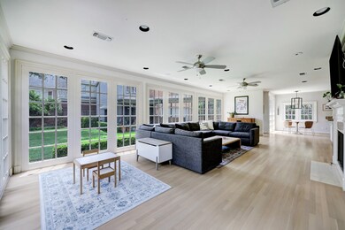 This light and bright den holds an incredible amount of space. Relax and enjoy the natural light that fills the space through ample windows.