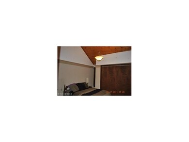 Vaulted knotty pine ceilings throughout the seond 