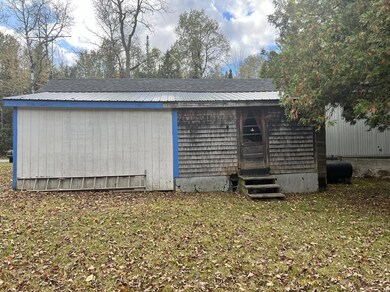 attached addition-wood shed