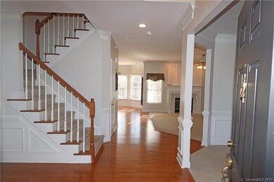 Front door entry view offers pre-finished hardwood