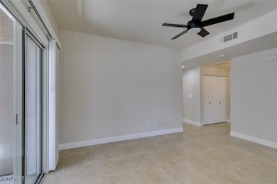 Unfurnished bedroom featuring light tile patterned