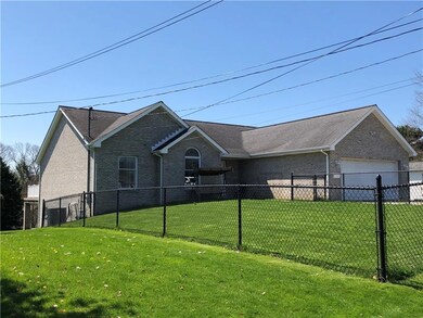 ANOTHER FRONT VIEW WITH SIDE VIEW OF EXPANSIVE REA