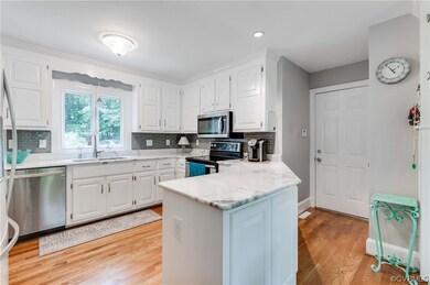 Kitchen featuring natural light, microwave, dishwa