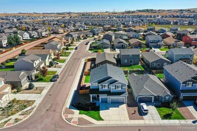 Aerial view of home and neighborhood
