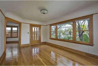 Restored Gumwood moldings and gleaming hardwood floors