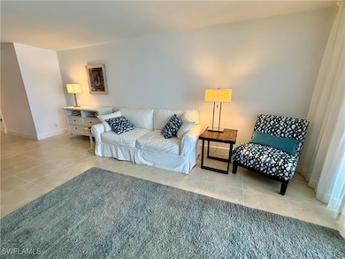 Tiled living room with baseboards