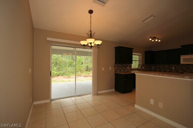 2004 Yuma Ct, Lehigh Acres, FL 33972 - photo 7