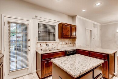 Gated patio just off the kitchen perfect for grill