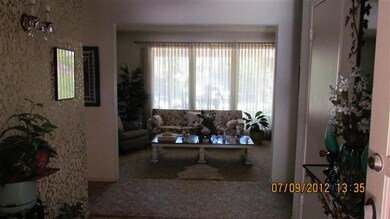 Beautiful formal living room with lovely view of r