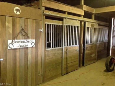 Four stall horse barn with loft for hay storage, t