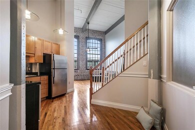 On the fourth floor (top floor), facing the courty