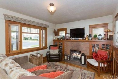 Living room with fireplace and built-ins