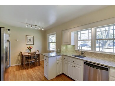 The updated kitchen has gorgeous granite counterto