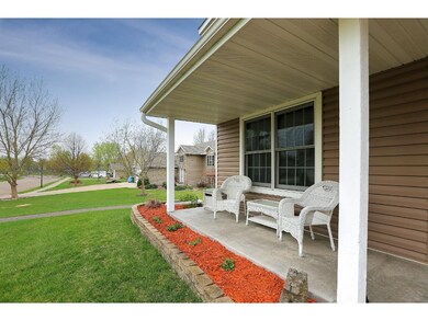 Relax on the front porch, beautiful landscaping on