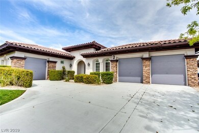Beautiful Stacked Stone accents adorn the garages.