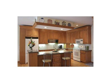 Kitchen. Island/breakfast bar for casual dining.