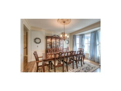 Formal dining with custom bump-out for hutch and b