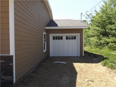 The home has its own attached garage, too!