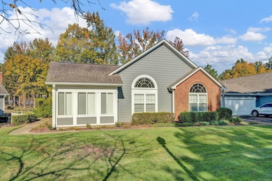 View of front of property with a front lawn and a 