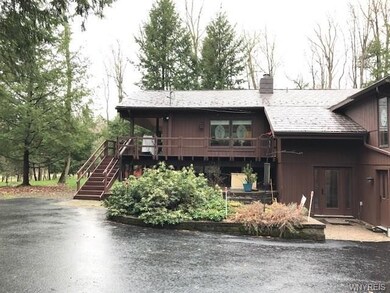 The stairway leads to a large deck with maintenanc