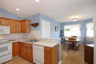 1369 Echoing Valley Dr SW unit 34, Byron Center, MI 49315 - photo 5