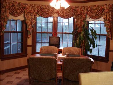 This Breakfast room looks out over the large back 