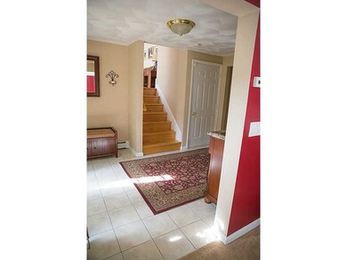 Entry. Oak stairs to the main living area