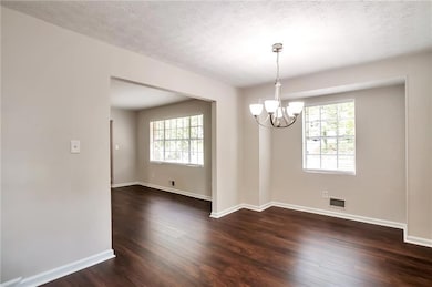 Unfurnished dining area featuring plenty of natura