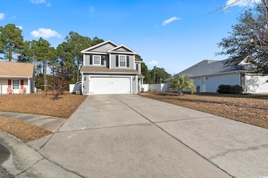 View of front property with a garage