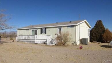 View of front of home featuring central air condit