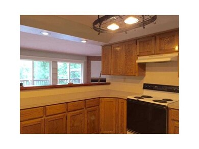 Kitchen. AMPLE CABINETS/STORAGE. FULL KITCHEN APPLIANCE PACKAGE. POT RACK X2. BREAKFST BAR.