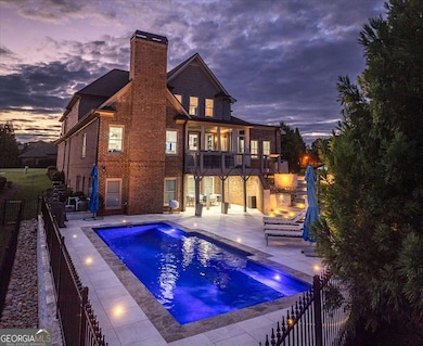 The resort-style backyard oasis, completed within the last year, is nothing short of spectacular. Enjoy the sparkling in-ground pool with LED lighting, a gas-powered heater for year-round use, and exquisite high-end pool deck tiles