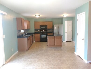View of kitchen from dining area